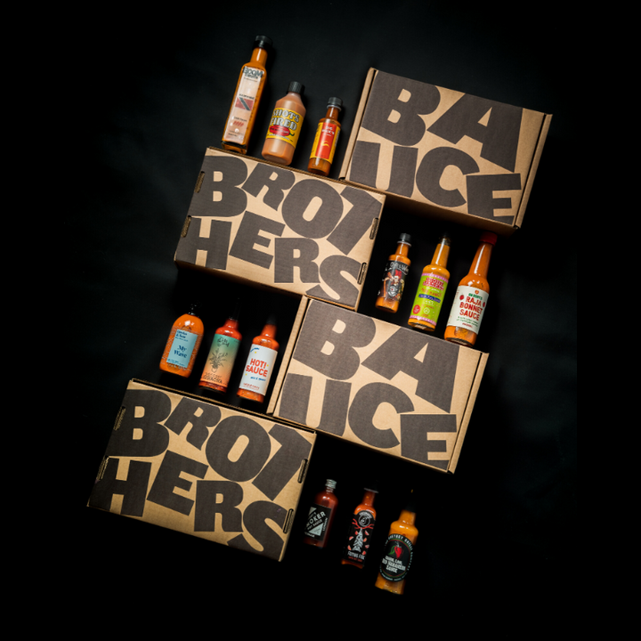 Twelve premium bottles of craft hot sauce 